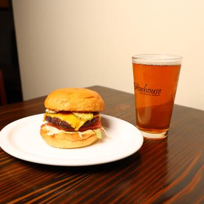 Brewhouse Cheeseburger with fries and a beer.