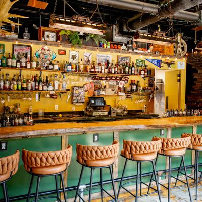 Interior, The bar has a rustic and industrial aesthetic.