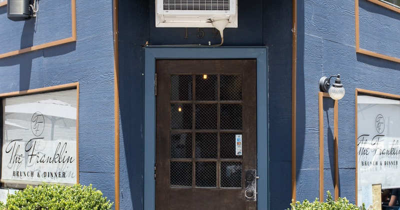 Exterior, corner entrance to restaurant