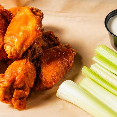 Wings and celery, close up.