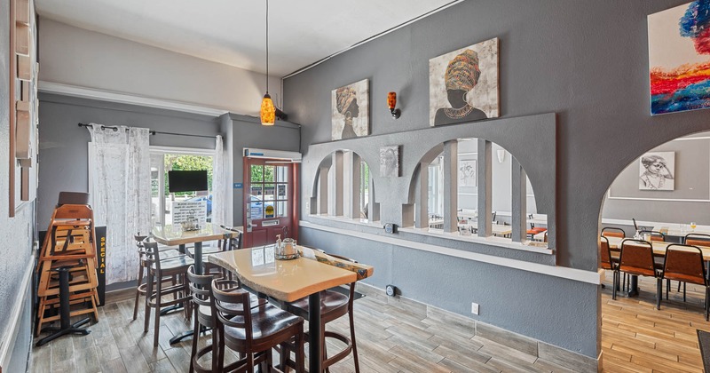 Seating area, tables with bar stools