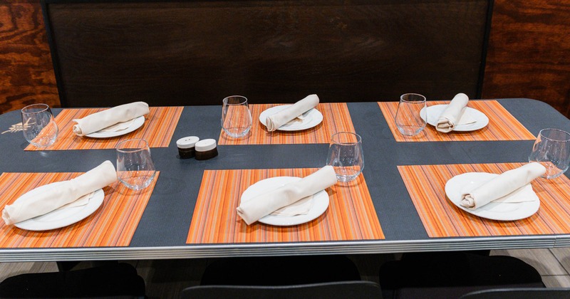 Interior, table set for guests