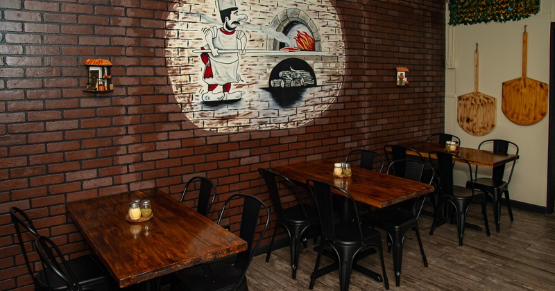 Interior of cozy pizza restaurant dining area