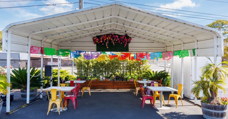 Exterior, colorful seating area