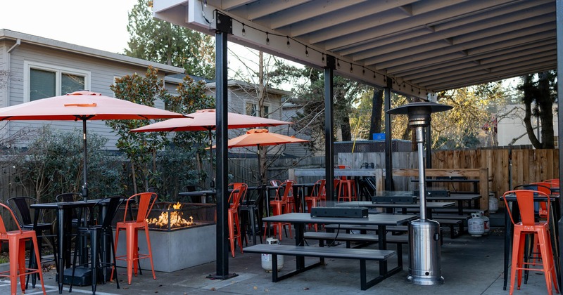 Exterior, covered patio, seating area, fireplace