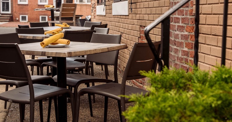 Exterior, tables and chairs lined up