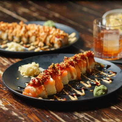 Sushi roll served with wasabi and ginger.