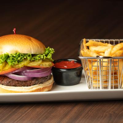 Classic burger with fries and ketchup.