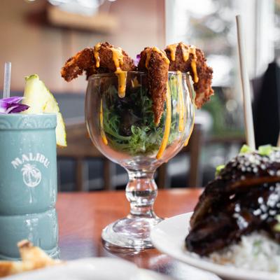 Fried shrimp served among assorted dishes.