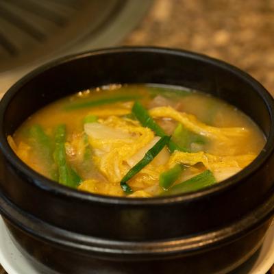 Korean cabbage soup with scallions.