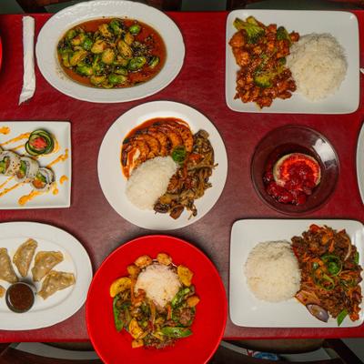 Various dishes served on the table, overhead view.
