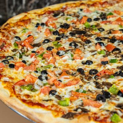 Vegetarian Pizza, with bell peppers, onions, mushrooms, black olives, and tomatoes.