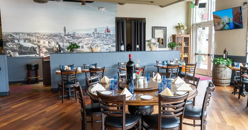 Interior, seating area, tables ready for guests