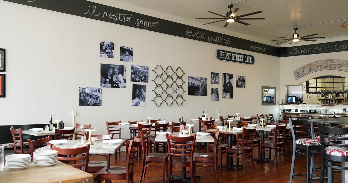Inside, seating area with tables and chairs