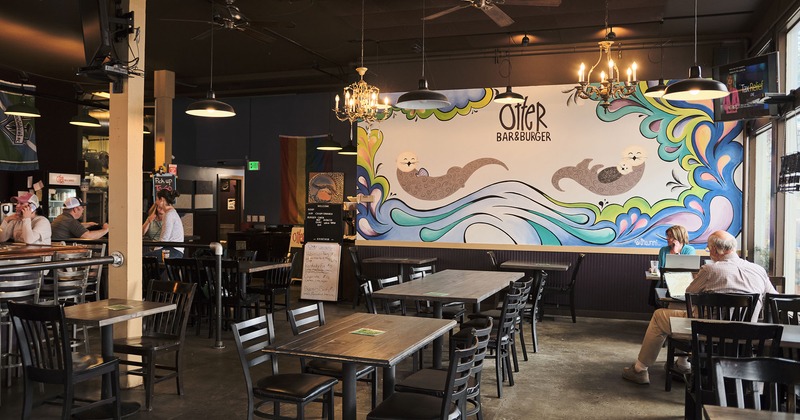 Interior, the seating area and the bar area with guests