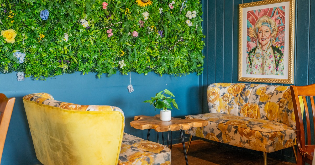 Interior, couch, armchairs, coffee table, paint on the wall