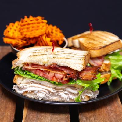 Triple Decker Turkey Club and sweet waffle fries.
