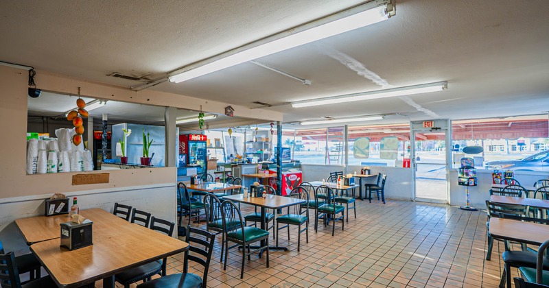 Interior dining area with tables and chairs