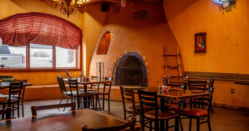 Interior, tables and chairs in seating area