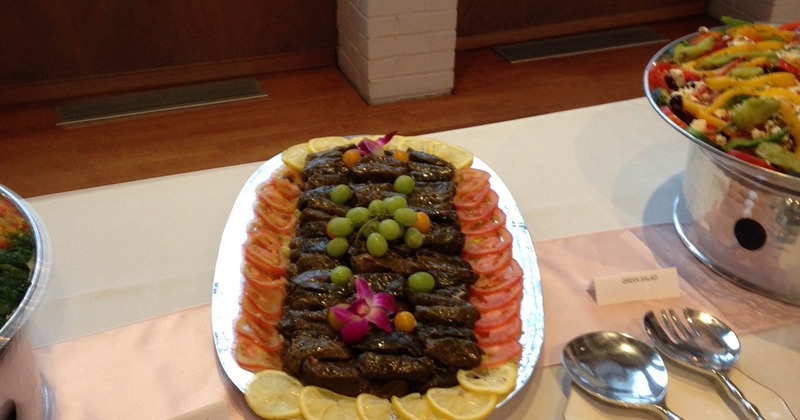 Salad trays arranged on a buffet table