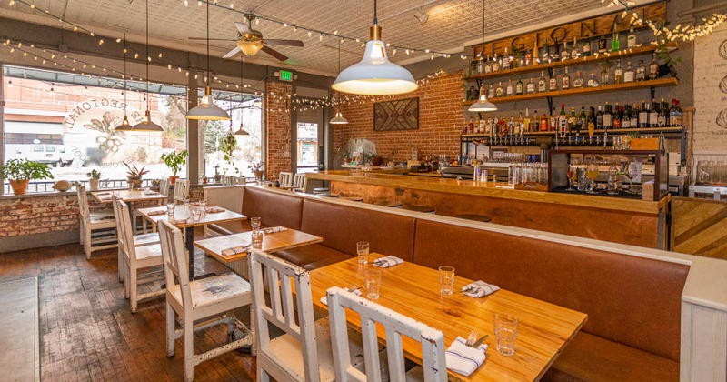 Interior, bar area, tables ready for guests