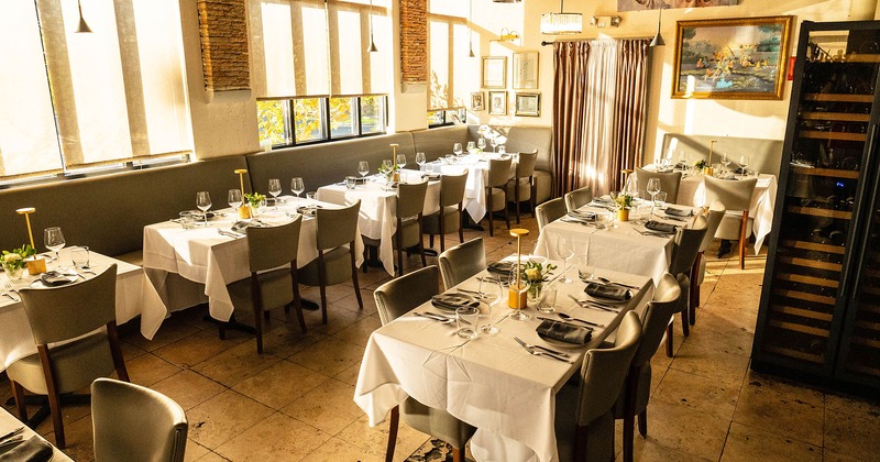 Interior, dining area, set tables ready for guests