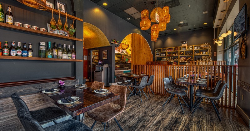 Nicely done interior dining area with set tables ready for guests