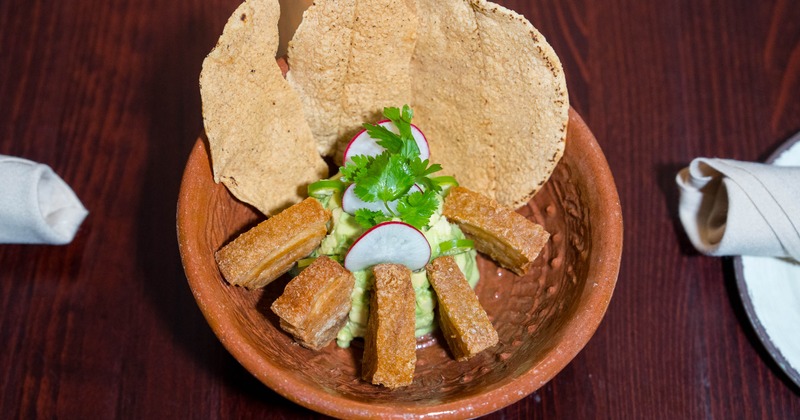 Guacamole with crispy pork skins