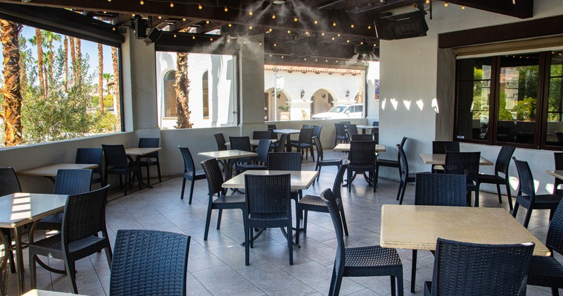 Exterior, tables and chairs on covered patio