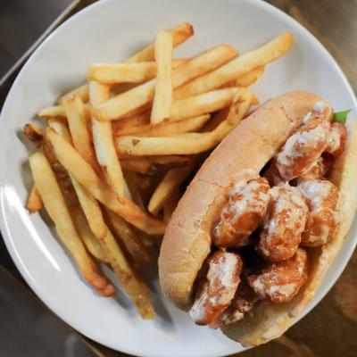 Birdie Bay Po Boy served with fries.