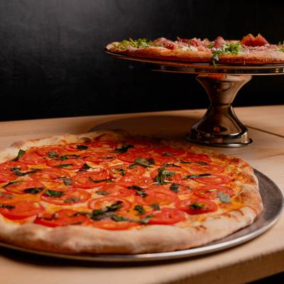 Margherita pizza and Prosciutto Arugula pizza.