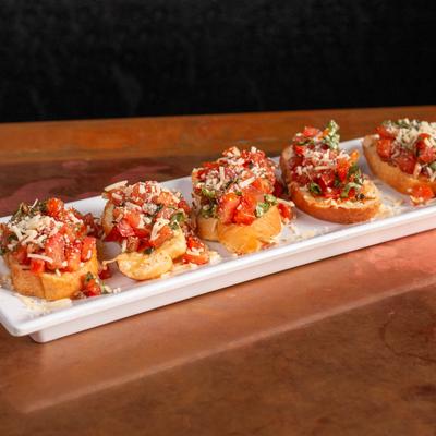 A plate of bruschetta.