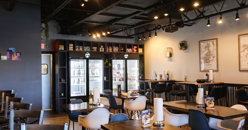 Decorated interior, seating area, fridge in the background