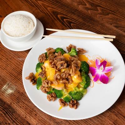 Walnut shrimp with broccoli and white rice on the side.