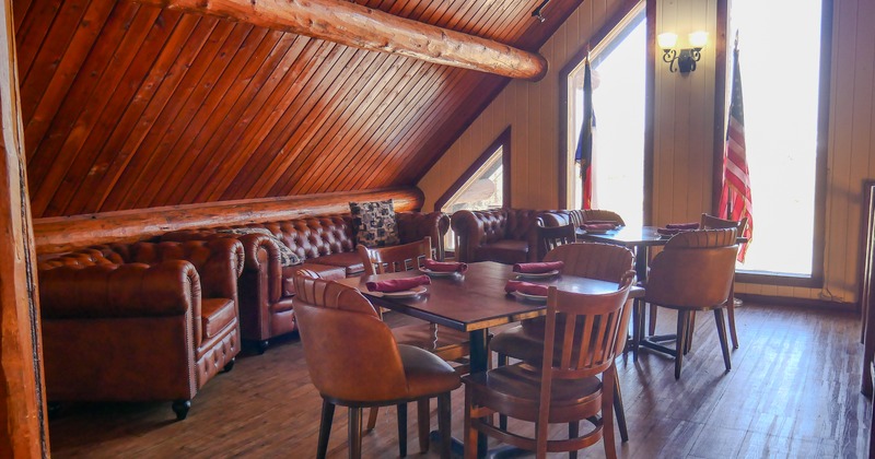 Interior, gallery above restaurant diner area, table, chairs