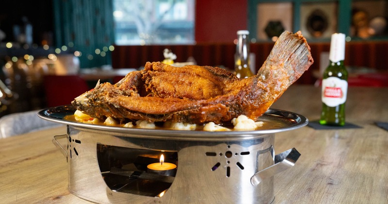 Deep-fried whole fish in sour and spicy clear curry