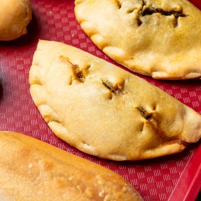 Golden baked empanadas.