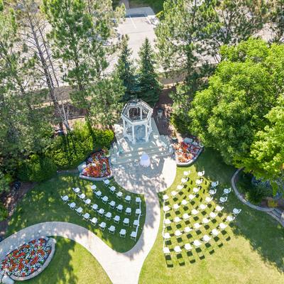 Aerial view of arranged white chairs for ceremony