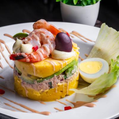 Peruvian potato and chicken salad stack, with shrimp.