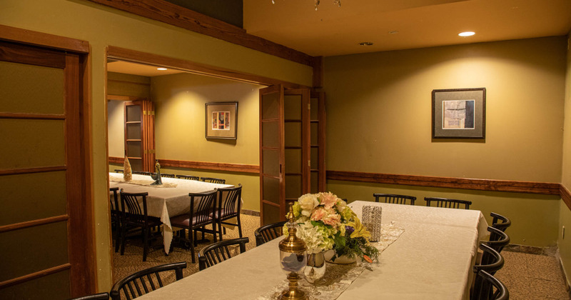Interior, long tables and chairs ready for guests