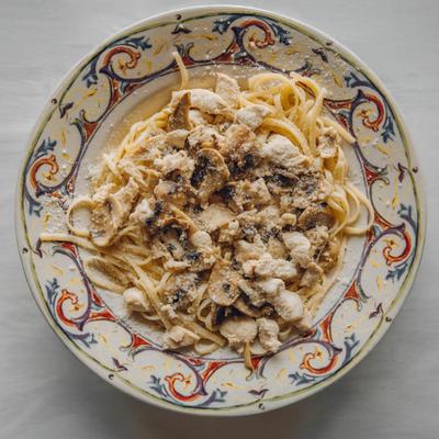 Penne Pasta with Chicken & Mushrooms in White Wine Sauce.