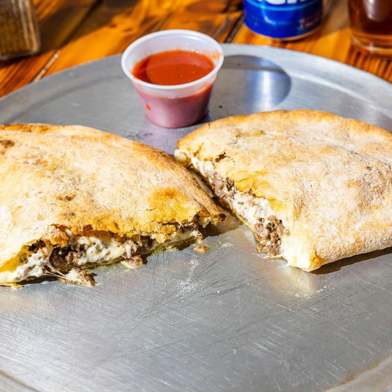 Beef steak, mozzarella, sauce photo