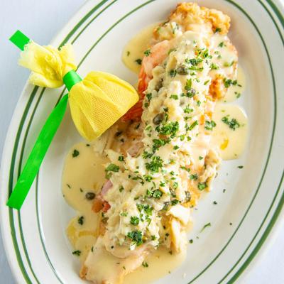 Trout Audrey - pan fried trout topped with jumbo shrimp and jumbo crabmeat in a white wine sauce with capers.