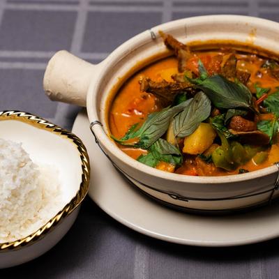 Basil Crispy Duck with white rice on the side.