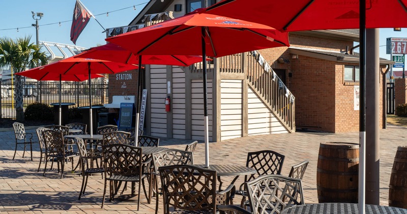 Outside area, tables for four people