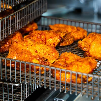 Fried chicken during preparation.