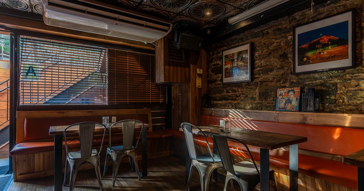 The restaurant's interior space, tables