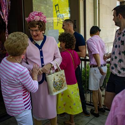 Women wearing pink dresses