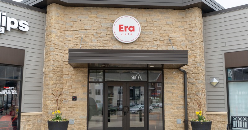 Exterior, front view, entrance, sign above