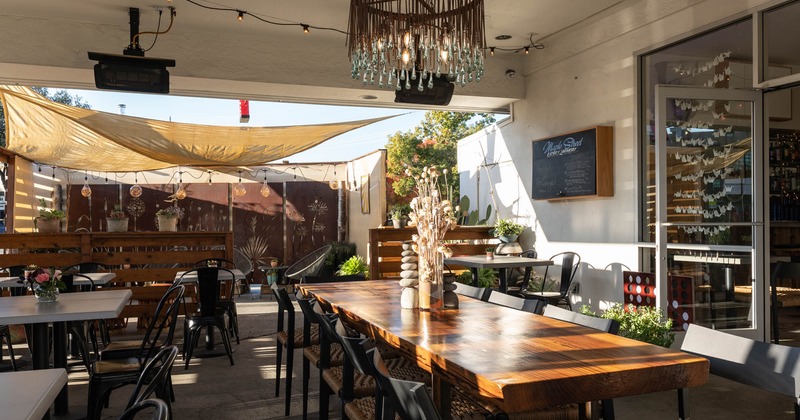 Interior, dining area, tables set for guests